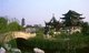 China: Premier Wu Zixu's Memorial Temple (right) and the Ruiguang Ta (Auspicious Light Pagoda) in the Pan Men Gate Park, Suzhou, Jiangsu Province
